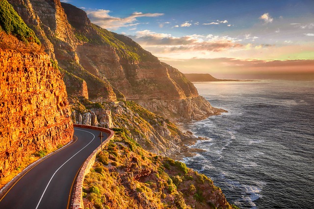 Cape Town by road, every curve dividing ocean, cloud, and mountain differently