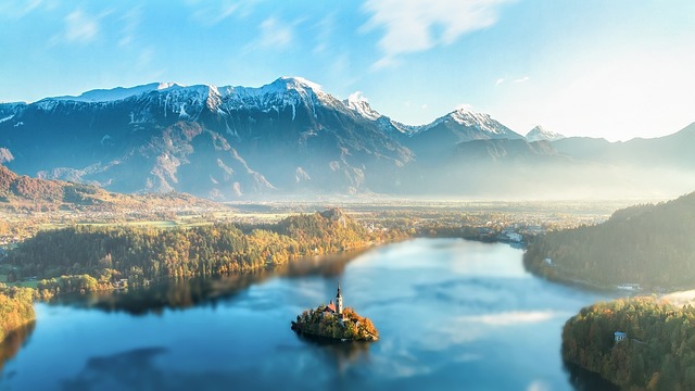 Slovenia with water so still the mountains appear twice